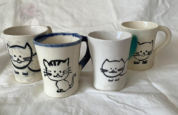 019-10  Mug Cup Cat series 4sets  Each 10x10x11h  Porcelain  2022  $200